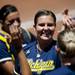 Michigan pitcher Haylie Wagner smiles after an inning in the game against Louisiana-Lafayette on Saturday, May 25. Daniel Brenner I AnnArbor.com